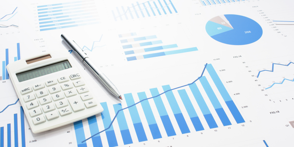 A graphic with charts, graphs and a calculator.